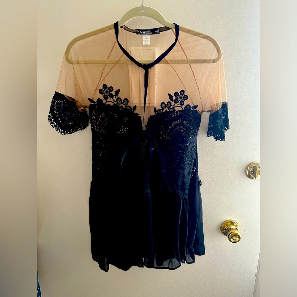 Sheer nude and black lace blouse